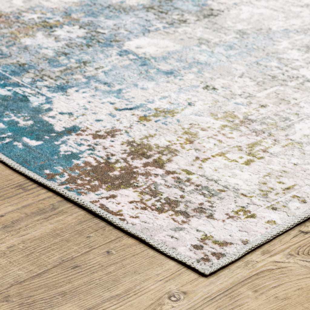 2' X 3' Ivory And Blue Abstract Printed Stain Resistant Non Skid Area Rug - Image 3