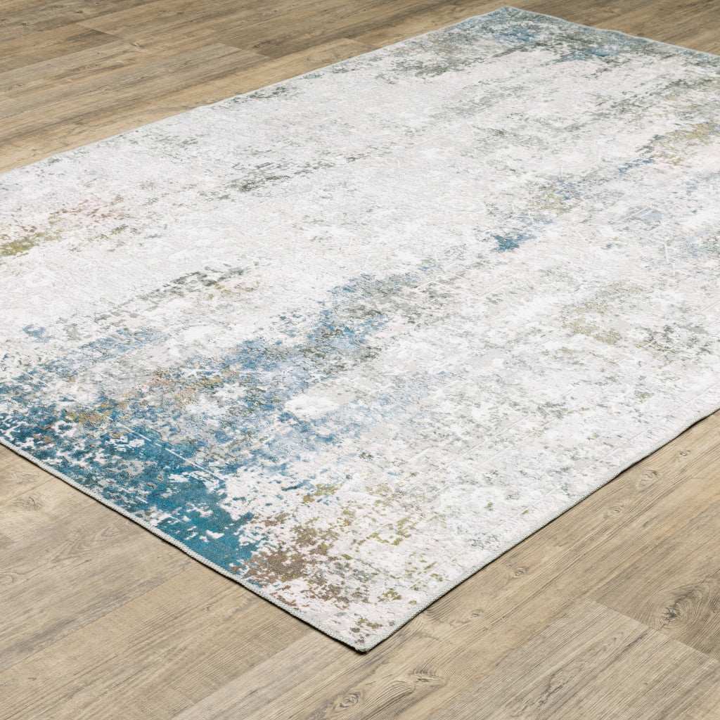 2' X 3' Ivory And Blue Abstract Printed Stain Resistant Non Skid Area Rug - Image 5