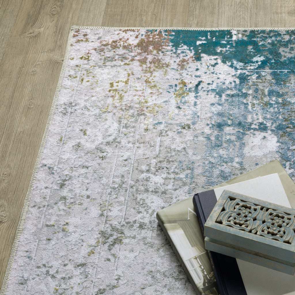2' X 3' Ivory And Blue Abstract Printed Stain Resistant Non Skid Area Rug - Image 6