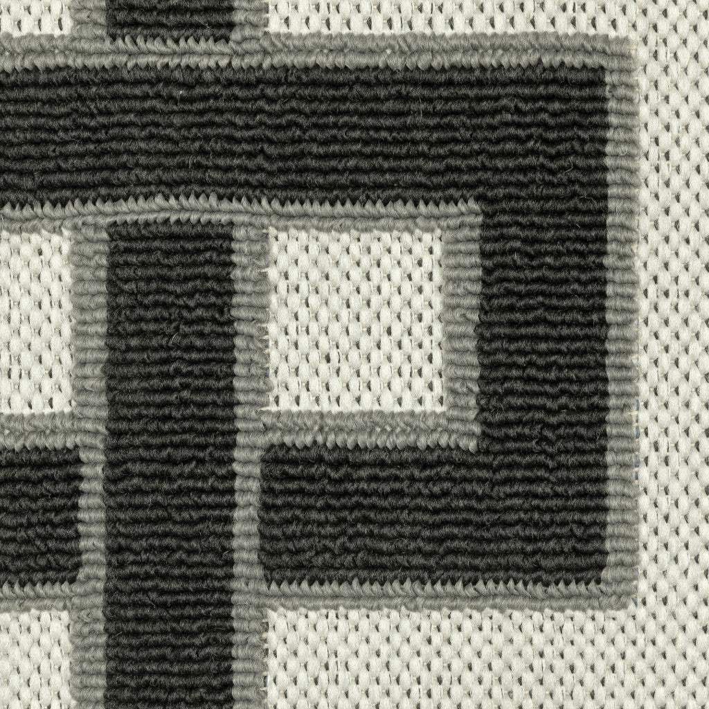 2' X 4' Beige and Black Stain Resistant Indoor Outdoor Area Rug - Image 3