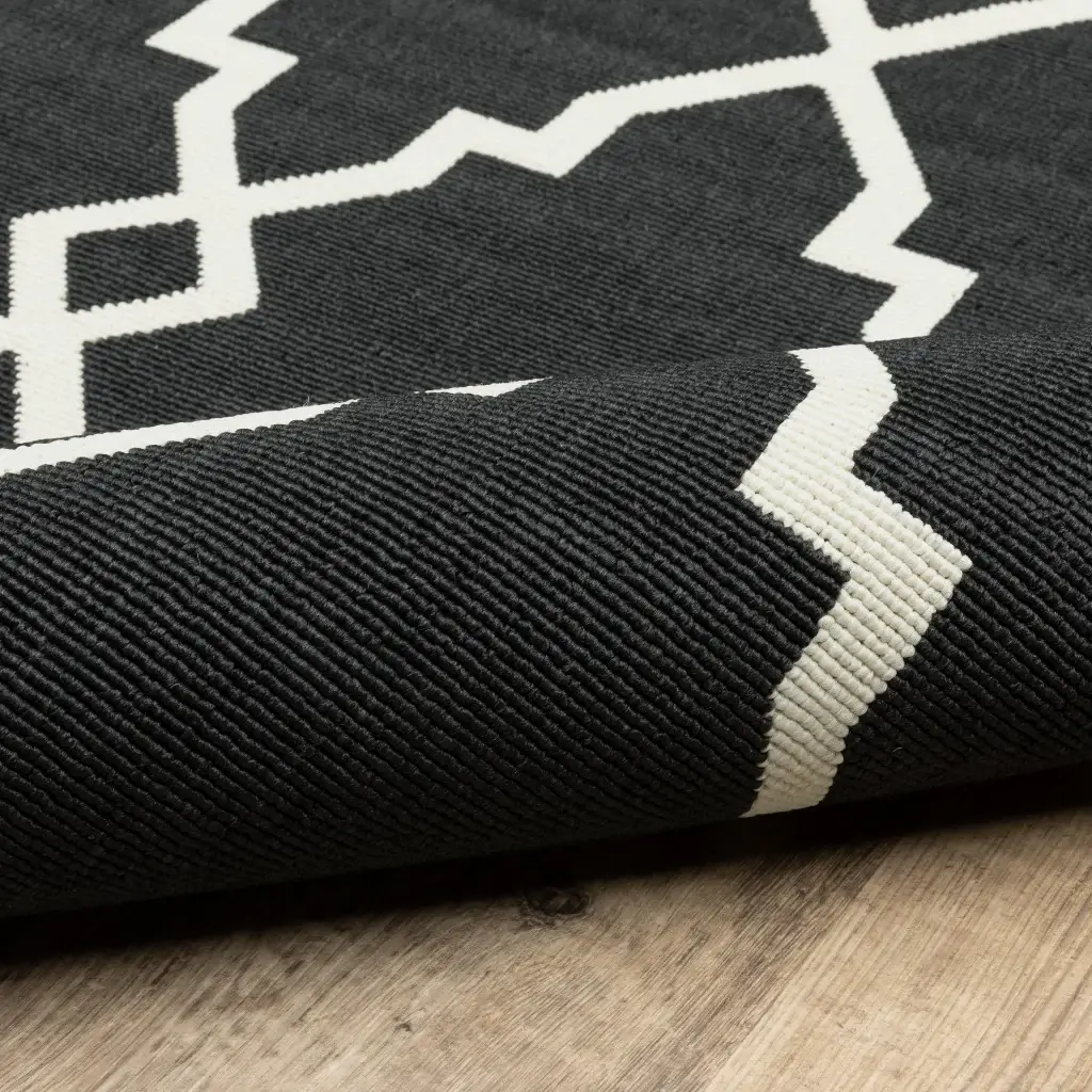 2' X 4' Black and Ivory Indoor Outdoor Area Rug - Image 4