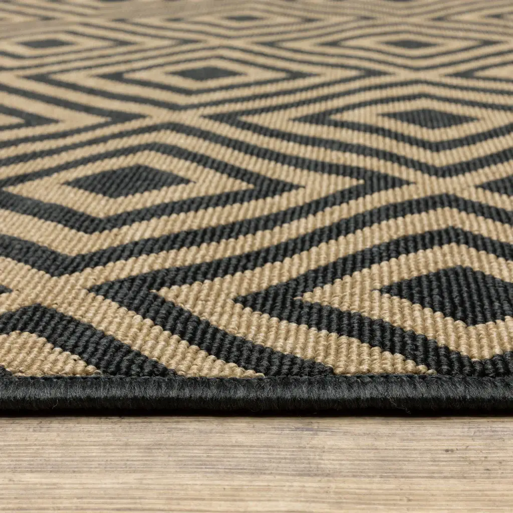 2' X 4' Black and Tan Geometric Stain Resistant Indoor Outdoor Area Rug - Image 3