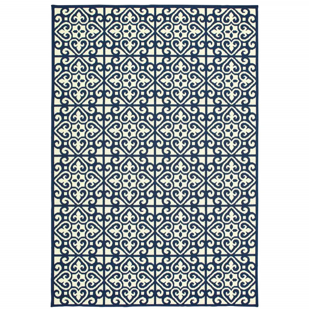 2' X 4' Ivory and Blue Geometric Stain Resistant Indoor Outdoor Area Rug