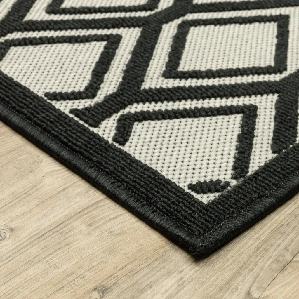 2' X 7' Beige and Black Geometric Stain Resistant Indoor Outdoor Area Rug - Image 4