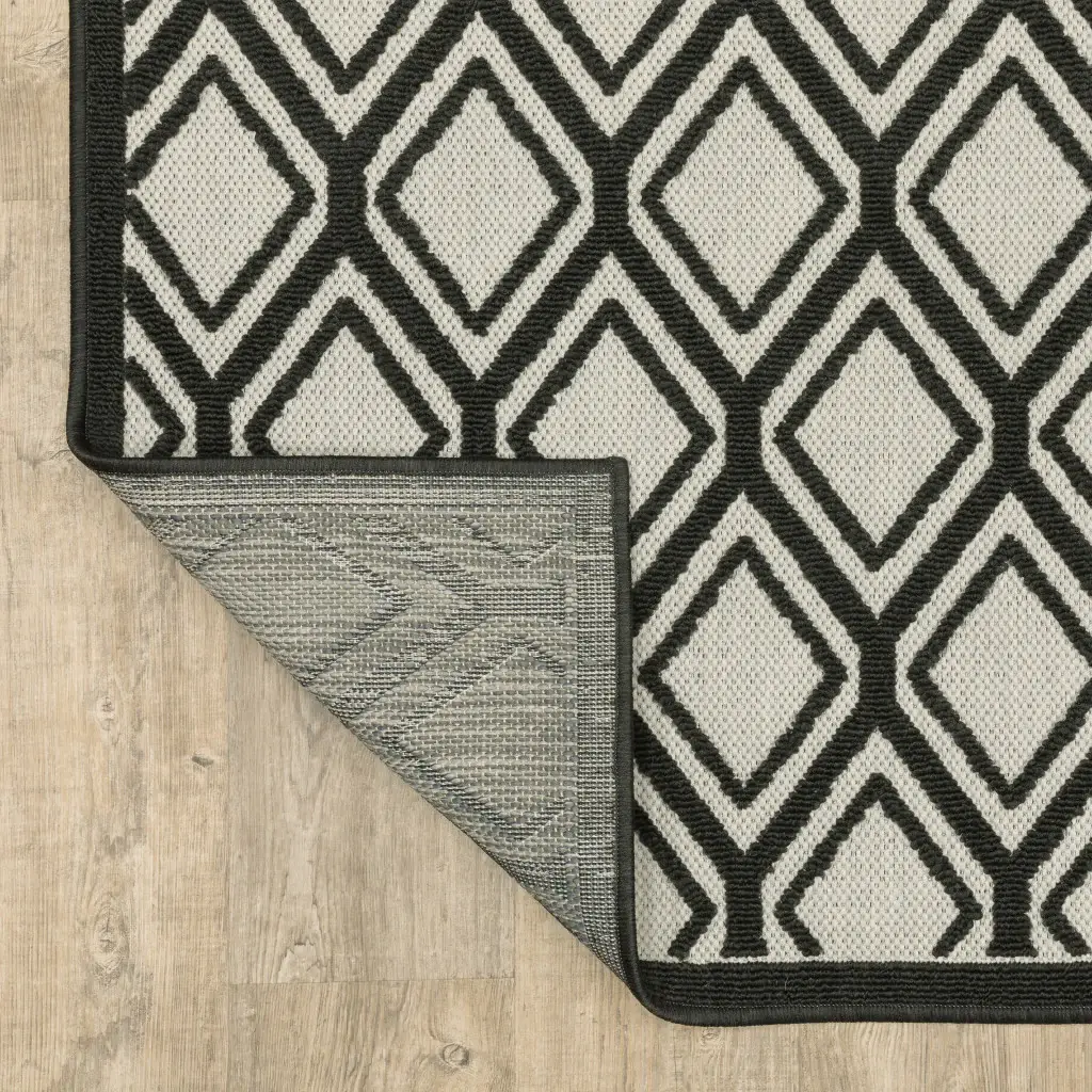 2' X 7' Beige and Black Geometric Stain Resistant Indoor Outdoor Area Rug - Image 7