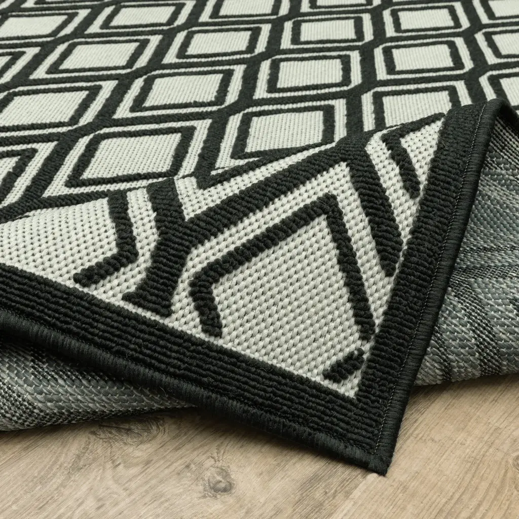 2' X 7' Beige and Black Geometric Stain Resistant Indoor Outdoor Area Rug - Image 9