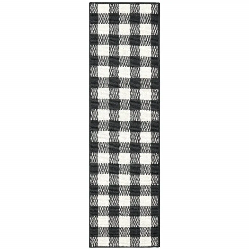 2' X 8' Black and Ivory Indoor Outdoor Area Rug