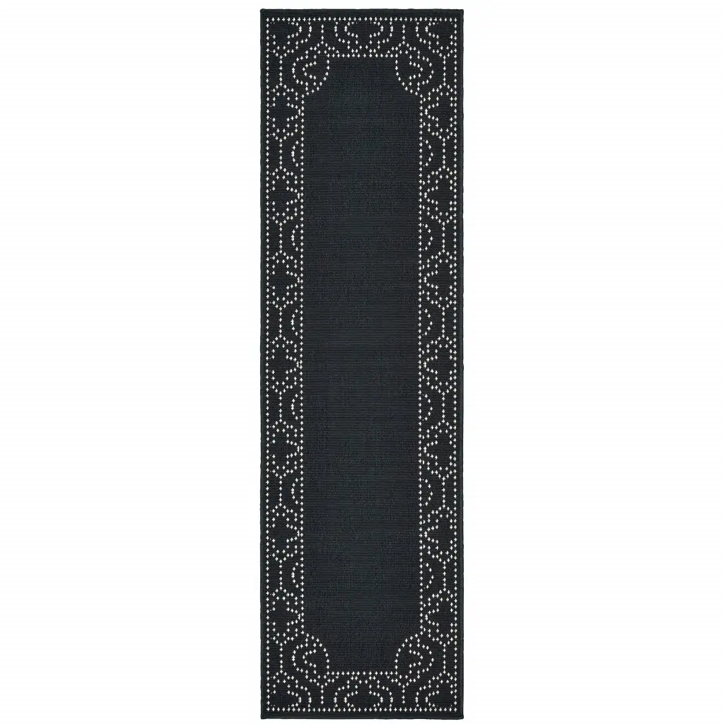2' X 8' Black and Ivory Stain Resistant Indoor Outdoor Area Rug