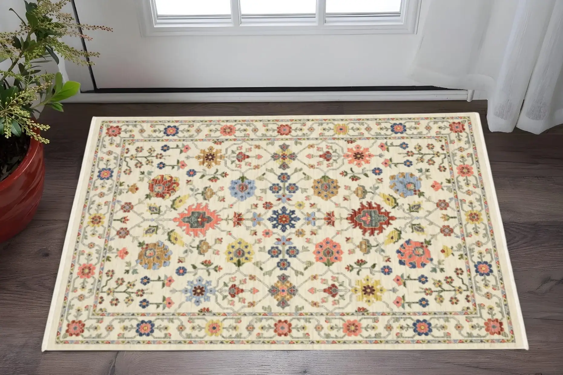 3' X 5' Ivory Salmon Pink Gold Blues Grey Rust And Green Oriental Power Loom Stain Resistant Area Rug With Fringe