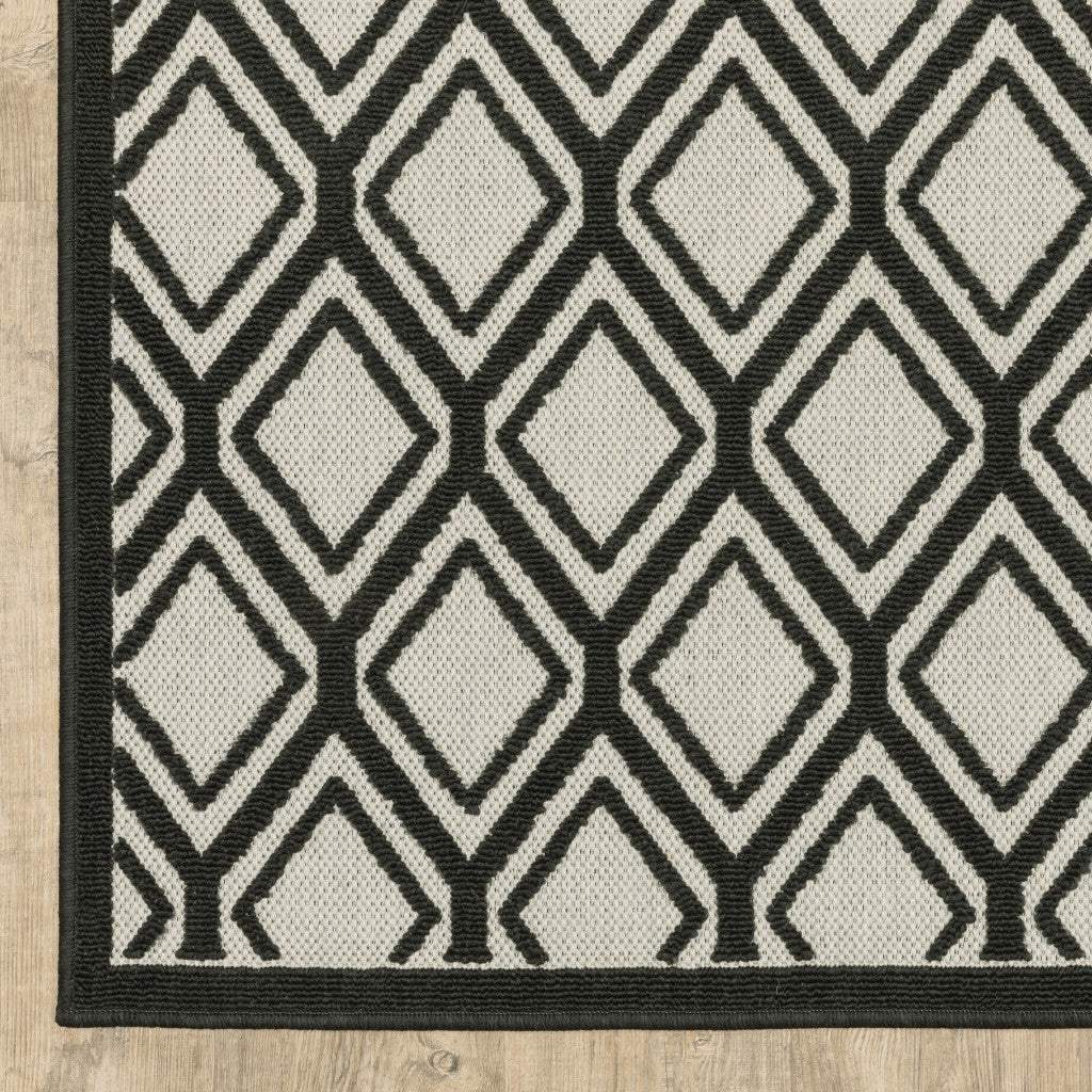 5' X 7' Beige and Black Geometric Stain Resistant Indoor Outdoor Area Rug - Image 3