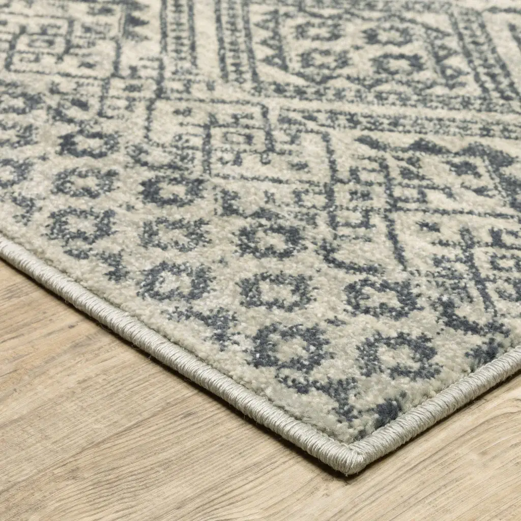 5' X 7' Blue And Beige Geometric Power Loom Stain Resistant Area Rug - Image 4
