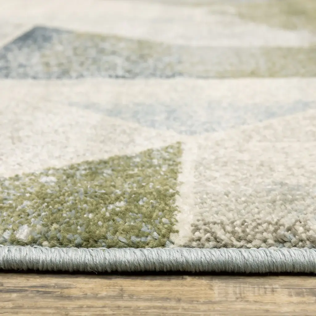 5' X 7' Blue Green Grey Gold And Ivory Geometric Power Loom Stain Resistant Area Rug - Image 4