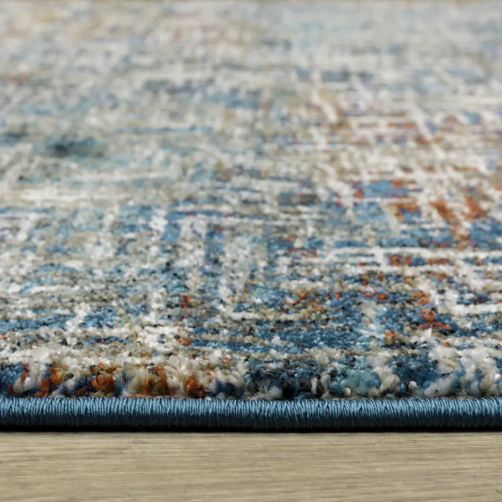 5' X 7' Blue Teal Gold Rust And Beige Abstract Power Loom Stain Resistant Area Rug - Image 5