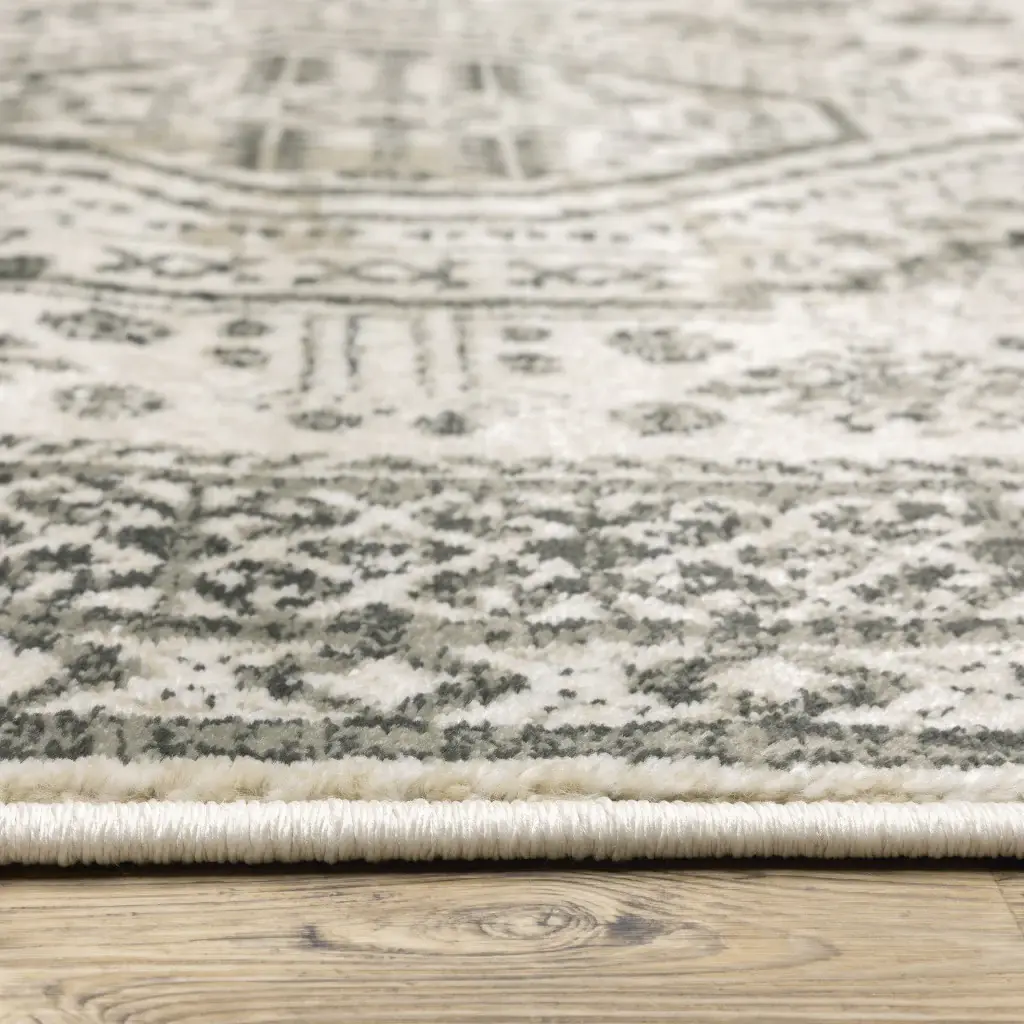 5' X 7' Ivory Grey Black And Ivory Oriental Power Loom Stain Resistant Area Rug - Image 4