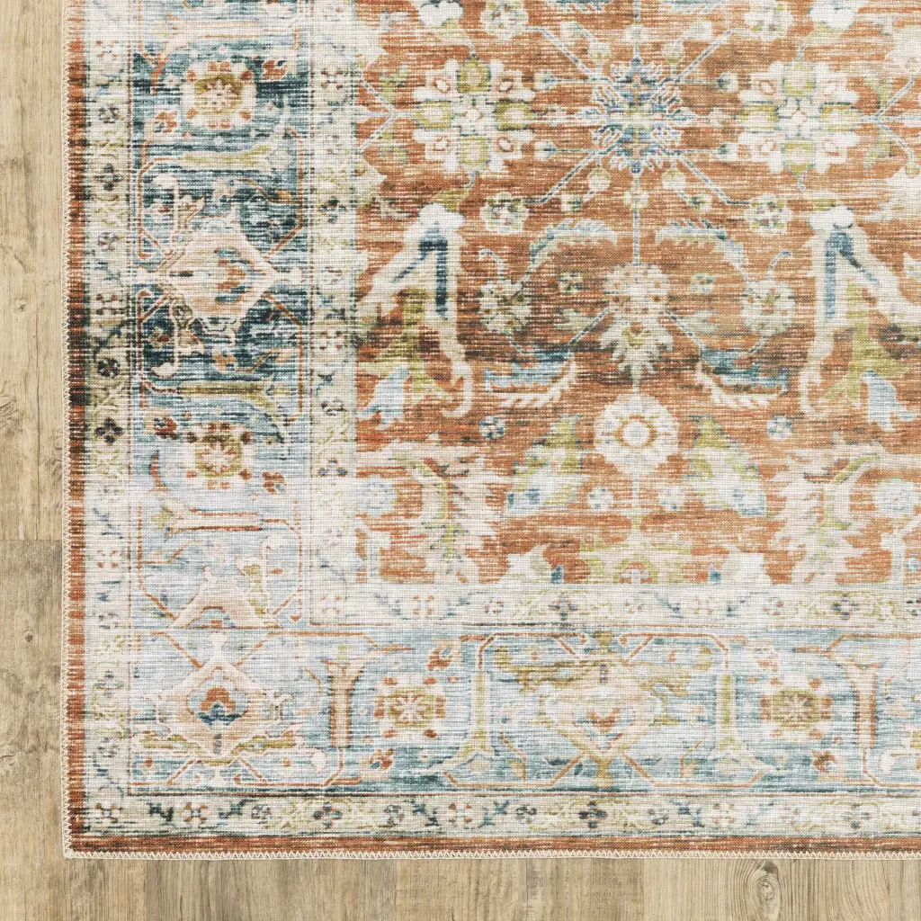 5' X 7' Rust Blue Ivory And Gold Oriental Printed Stain Resistant Non Skid Area Rug - Image 4