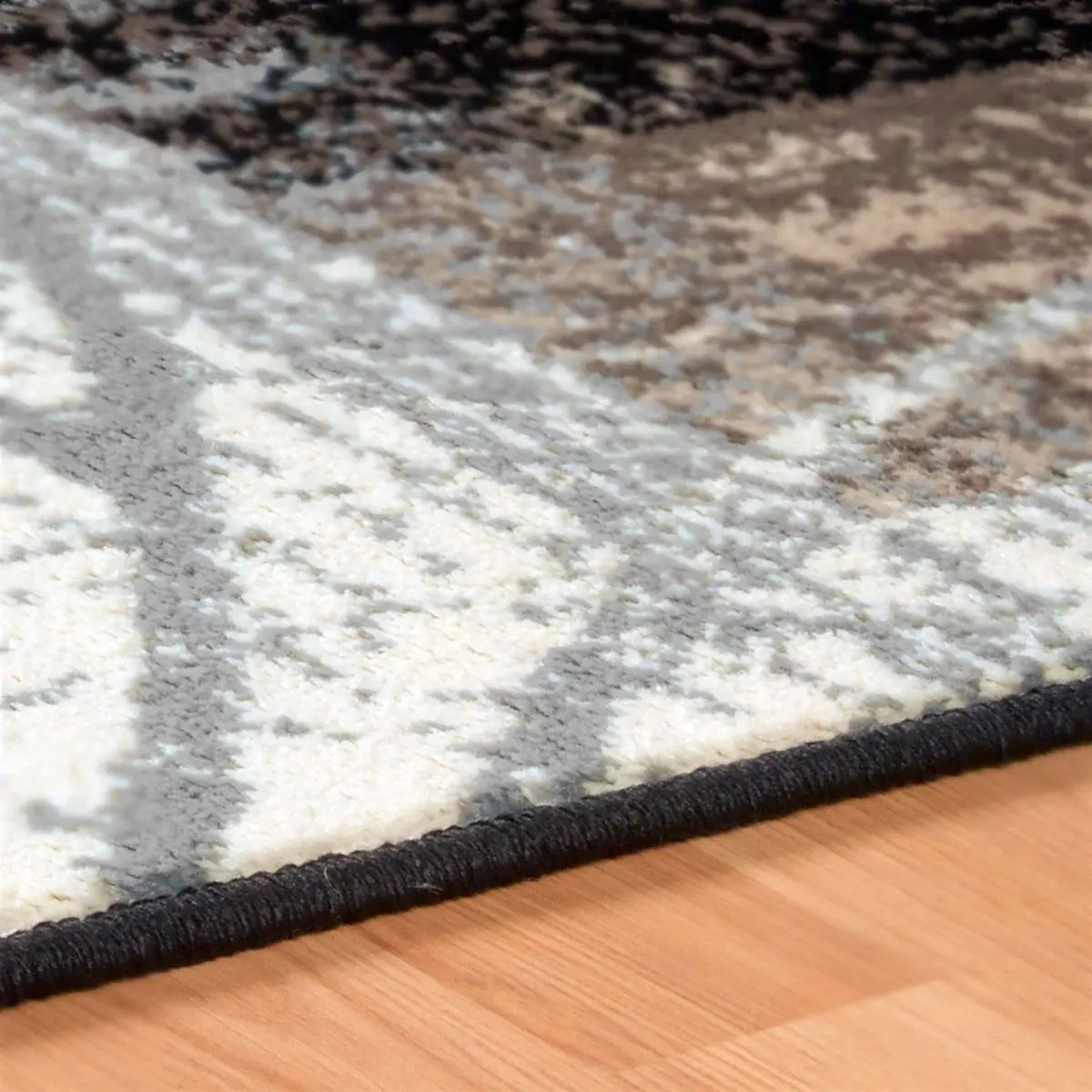 5' X 8' Beige And Gray Floral Power Loom Distressed Stain Resistant Area Rug - Image 2