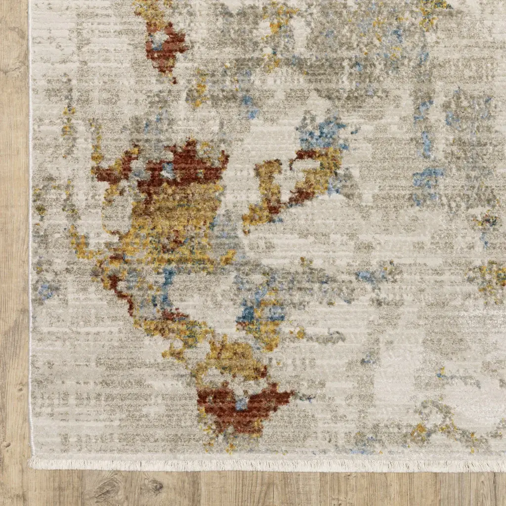5' X 8' Beige Grey Gold Blue Rust And Teal Abstract Power Loom Stain Resistant Area Rug With Fringe - Image 4