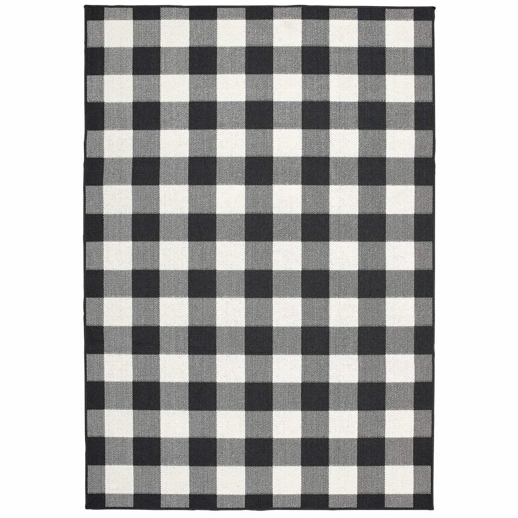5' X 8' Black and Ivory Indoor Outdoor Area Rug