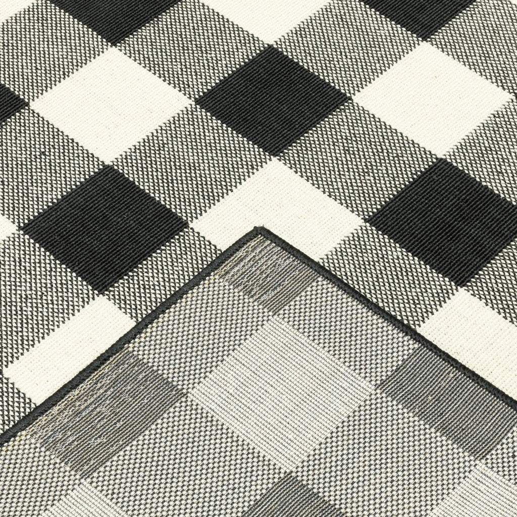 5' X 8' Black and Ivory Indoor Outdoor Area Rug - Image 4