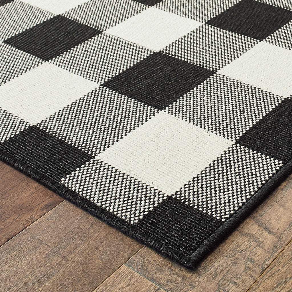 5' X 8' Black and Ivory Indoor Outdoor Area Rug - Image 8