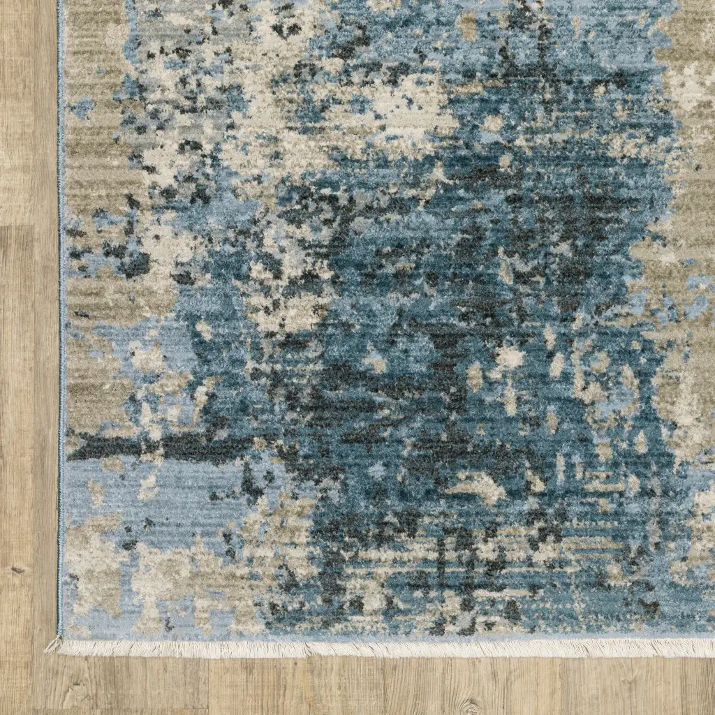 5' X 8' Blue Grey Ivory Light Blue And Dark Blue Abstract Power Loom Stain Resistant Area Rug With Fringe - Image 4
