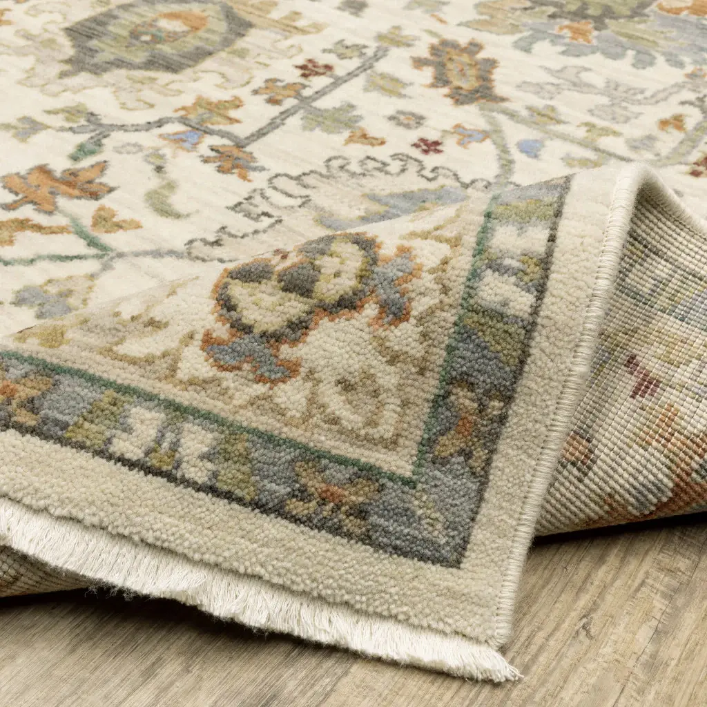 5' X 8' Brown And Ivory Oriental Power Loom Stain Resistant Area Rug With Fringe - Image 7