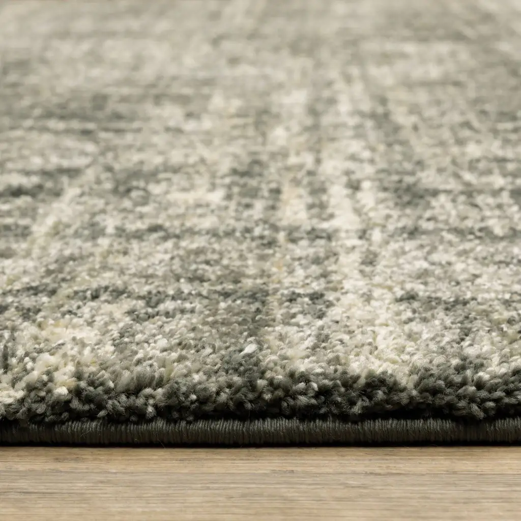 5' X 8' Charcoal Grey Beige And Tan Abstract Power Loom Stain Resistant Area Rug - Image 5