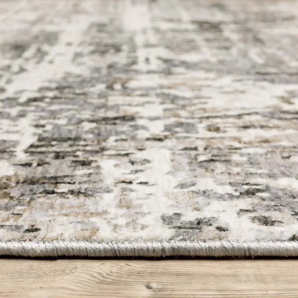 5' X 8' Grey Ivory Beige Charcoal Black Tan And Brown Abstract Power Loom Stain Resistant Area Rug - Image 4