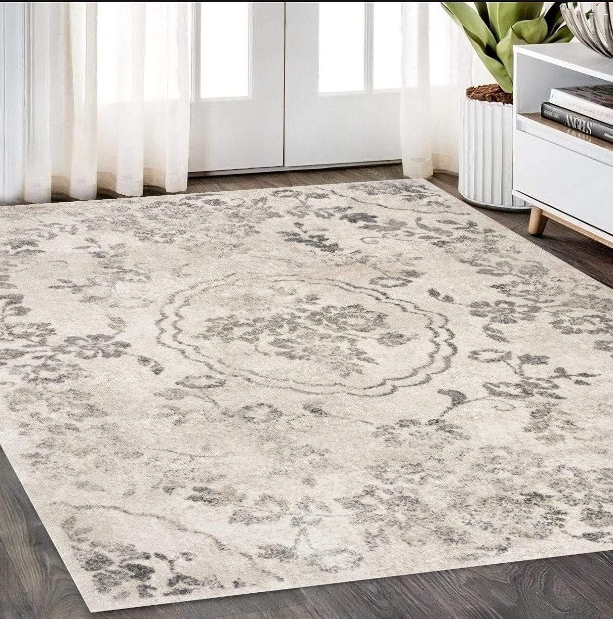 5' X 8' Grey Machine Woven Distressed Floral Medallion Indoor Area Rug