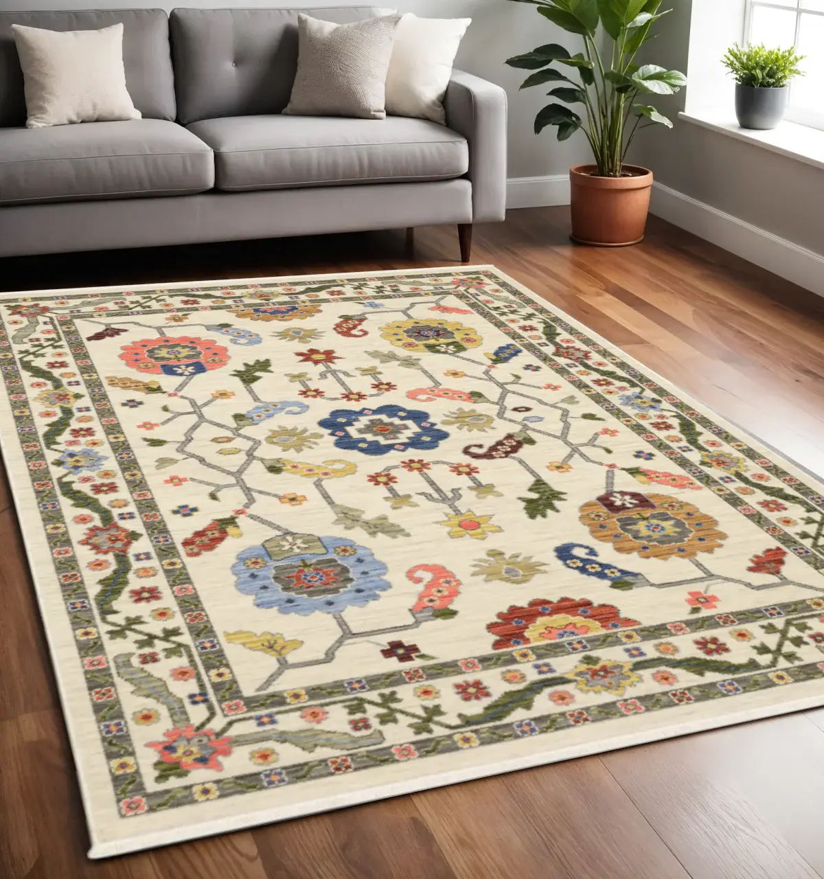 5' X 8' Ivory Green Blues Pink Yellow Rust Brown Tan And Grey Oriental Power Loom Stain Resistant Area Rug With Fringe