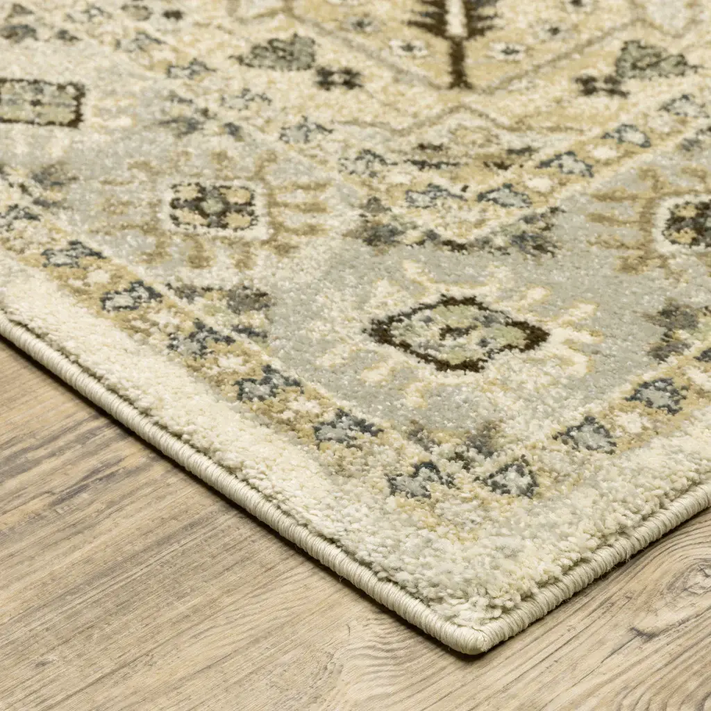 6' X 9' Beige Grey Tan And Brown Oriental Power Loom Stain Resistant Area Rug - Image 3