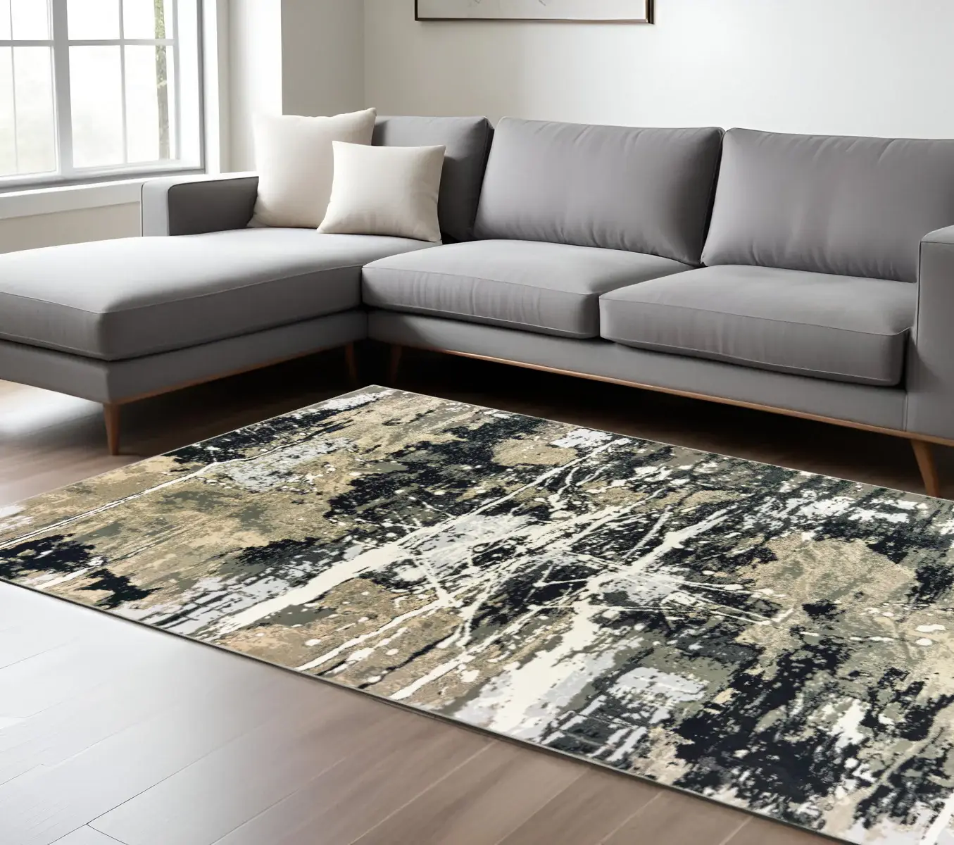 6' X 9' Black Gold Grey And Ivory Abstract Power Loom Stain Resistant Area Rug