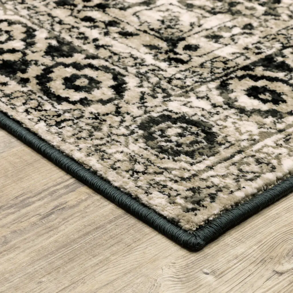 6' X 9' Black Grey Tan And Ivory Oriental Power Loom Stain Resistant Area Rug - Image 4