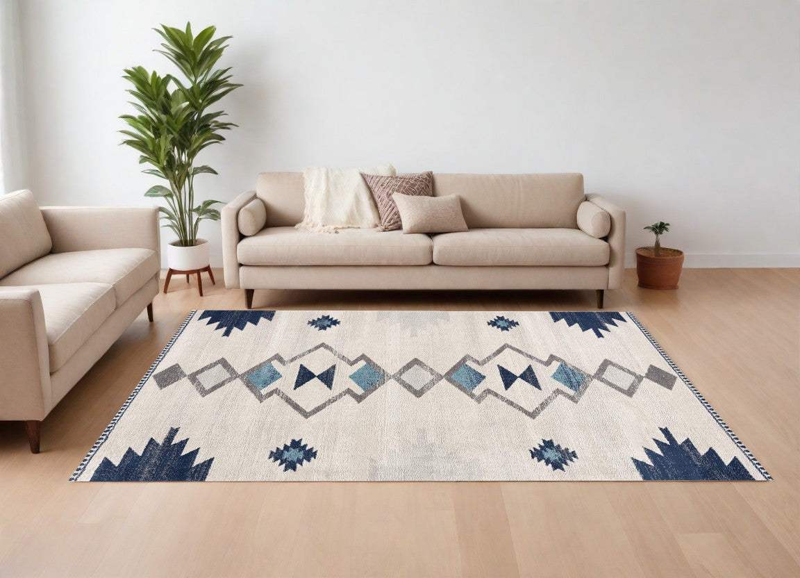 6' X 9' Blue and Ivory Southwestern Area Rug