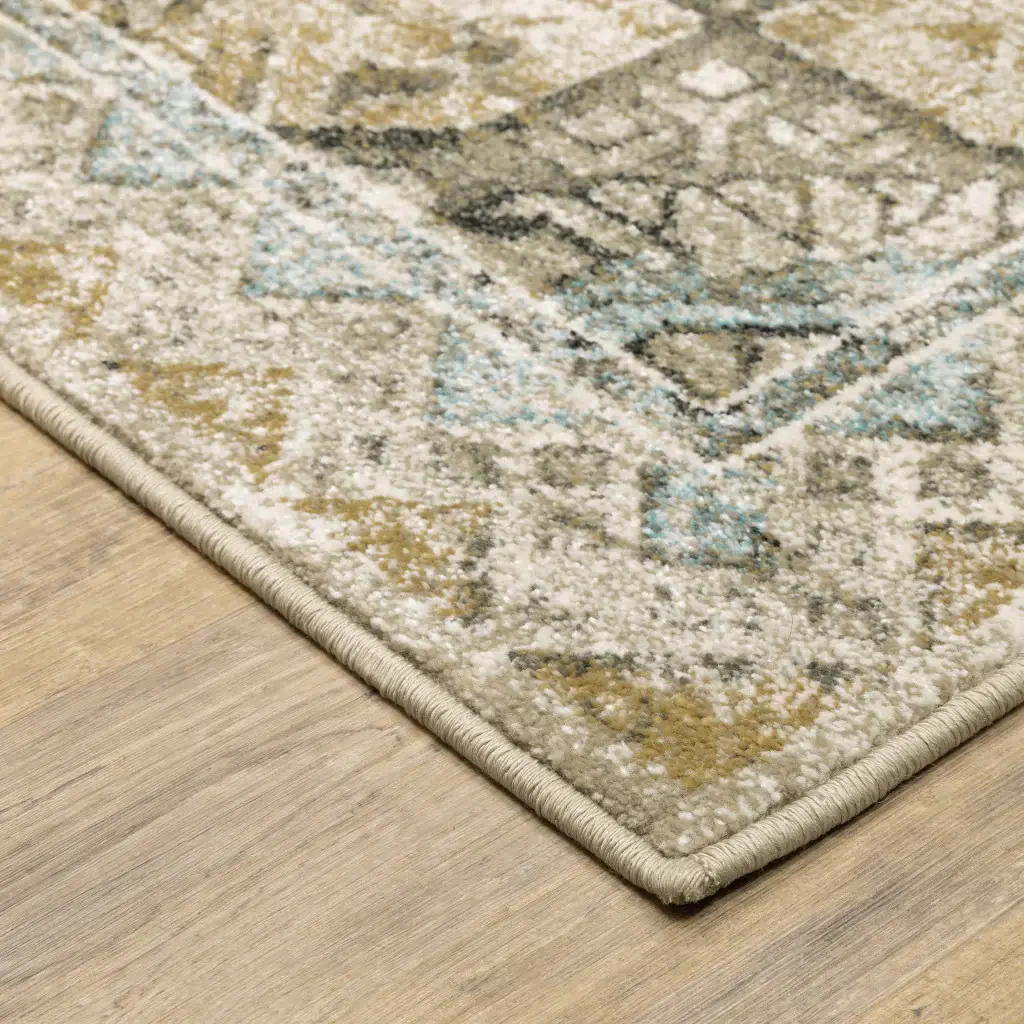 6' X 9' Grey Blue Beige And Gold Oriental Power Loom Stain Resistant Area Rug - Image 5