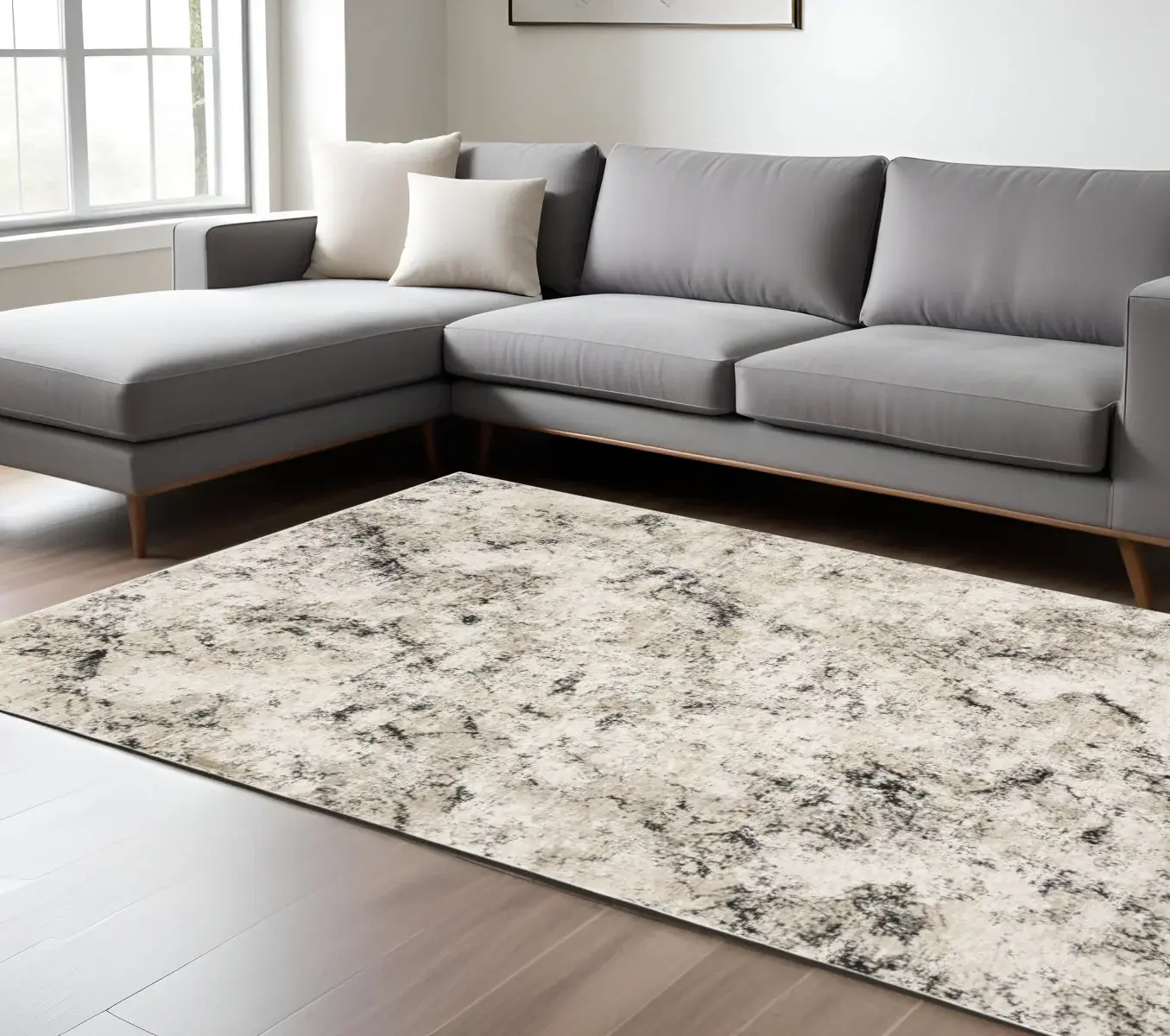 6' X 9' Ivory Grey Black Beige And Tan Abstract Power Loom Stain Resistant Area Rug