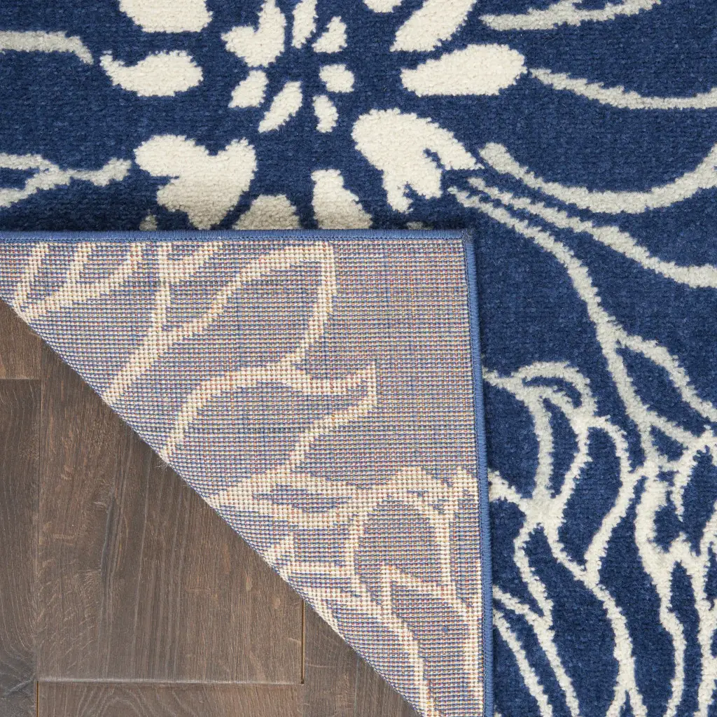7' X 10' Blue And Ivory Floral Power Loom Area Rug - Image 4
