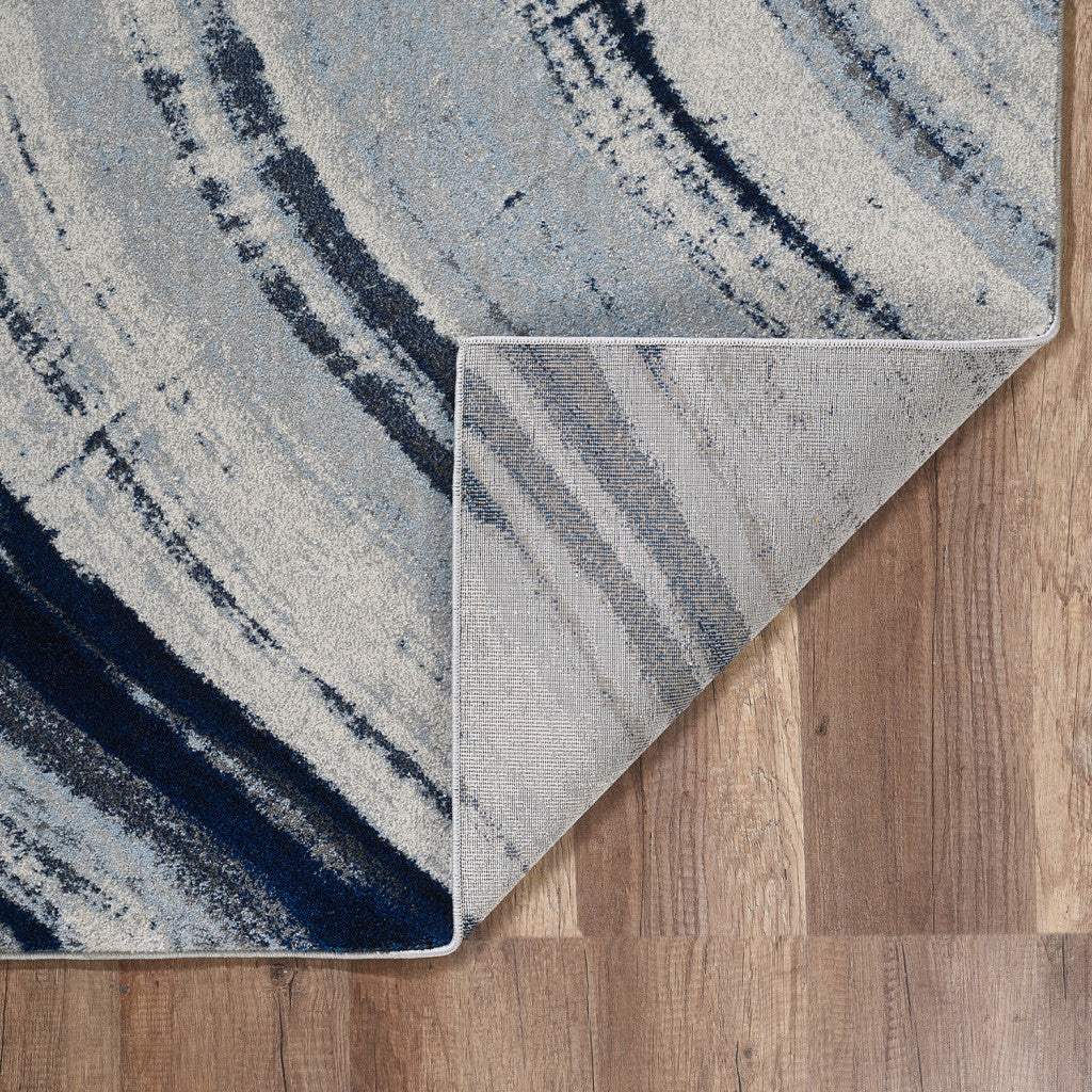 7' X 10' Ivory and Blue Abstract Area Rug - Image 2