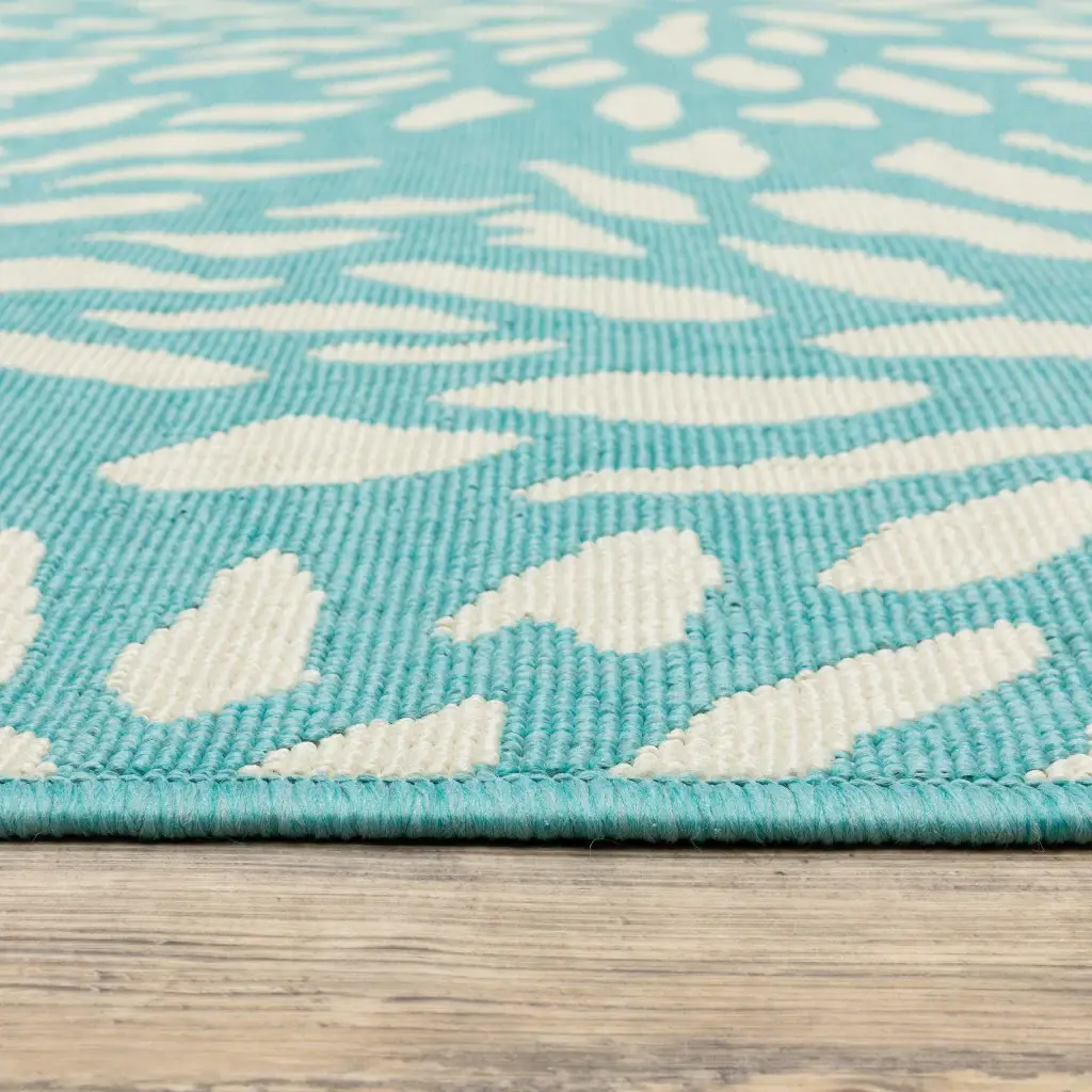 8' X 11' Blue and Ivory Floral Stain Resistant Indoor Outdoor Area Rug - Image 3