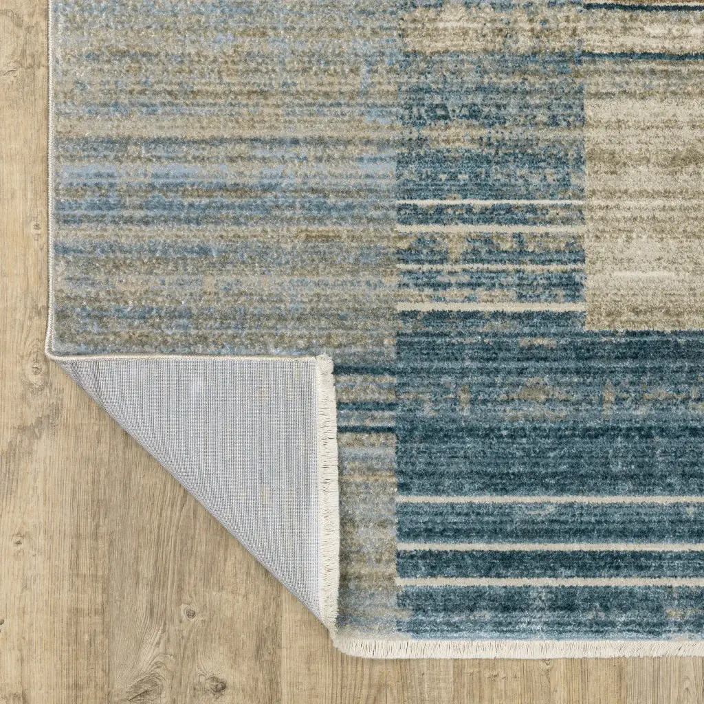 8' X 11' Blue Dark Blue Teal Grey Ivory Beige And Tan Geometric Power Loom Stain Resistant Area Rug With Fringe - Image 6