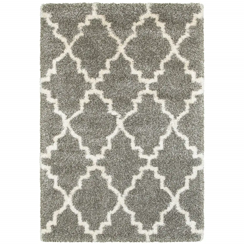 8' X 11' Grey And Ivory Geometric Shag Power Loom Stain Resistant Area Rug