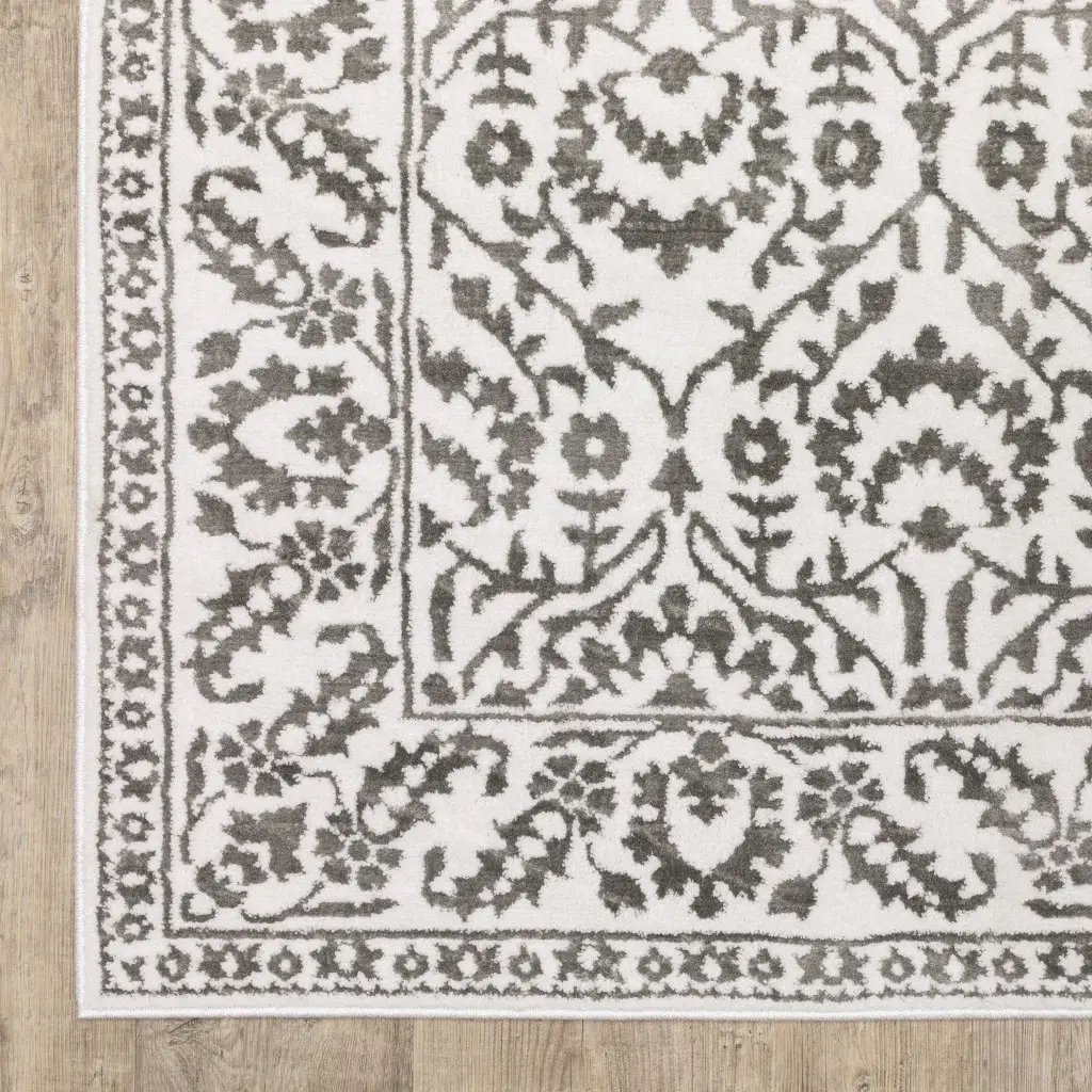 8' X 11' Grey And White Floral Power Loom Stain Resistant Area Rug - Image 4