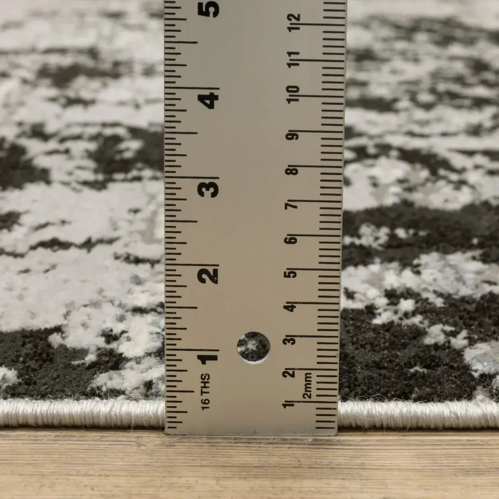8' X 11' Grey Charcoal Black And Ivory Abstract Power Loom Stain Resistant Area Rug - Image 8