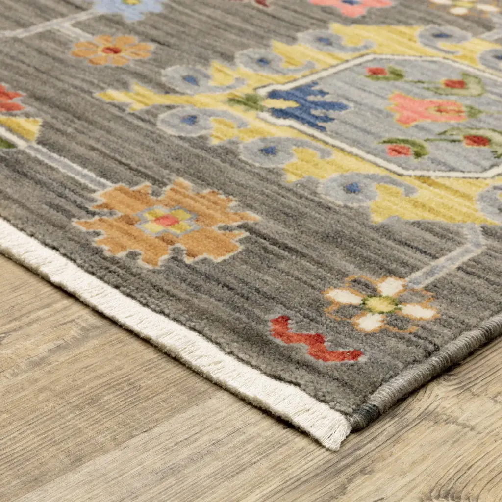 8' X 11' Grey Charcoal Yellow Blue Rust Red Pink Green And Ivory Oriental Power Loom Stain Resistant Area Rug With Fringe - Image 4