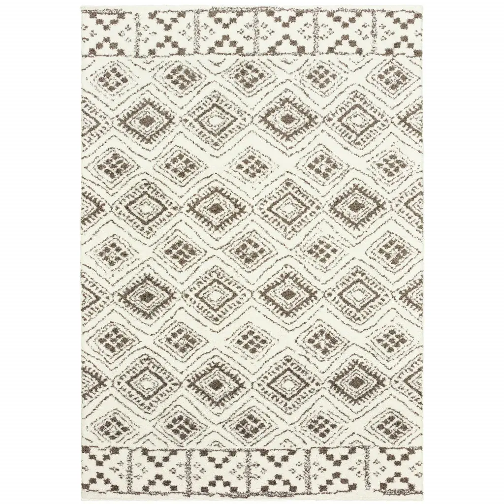 8' X 11' Ivory And Brown Geometric Shag Power Loom Stain Resistant Area Rug - Image 2