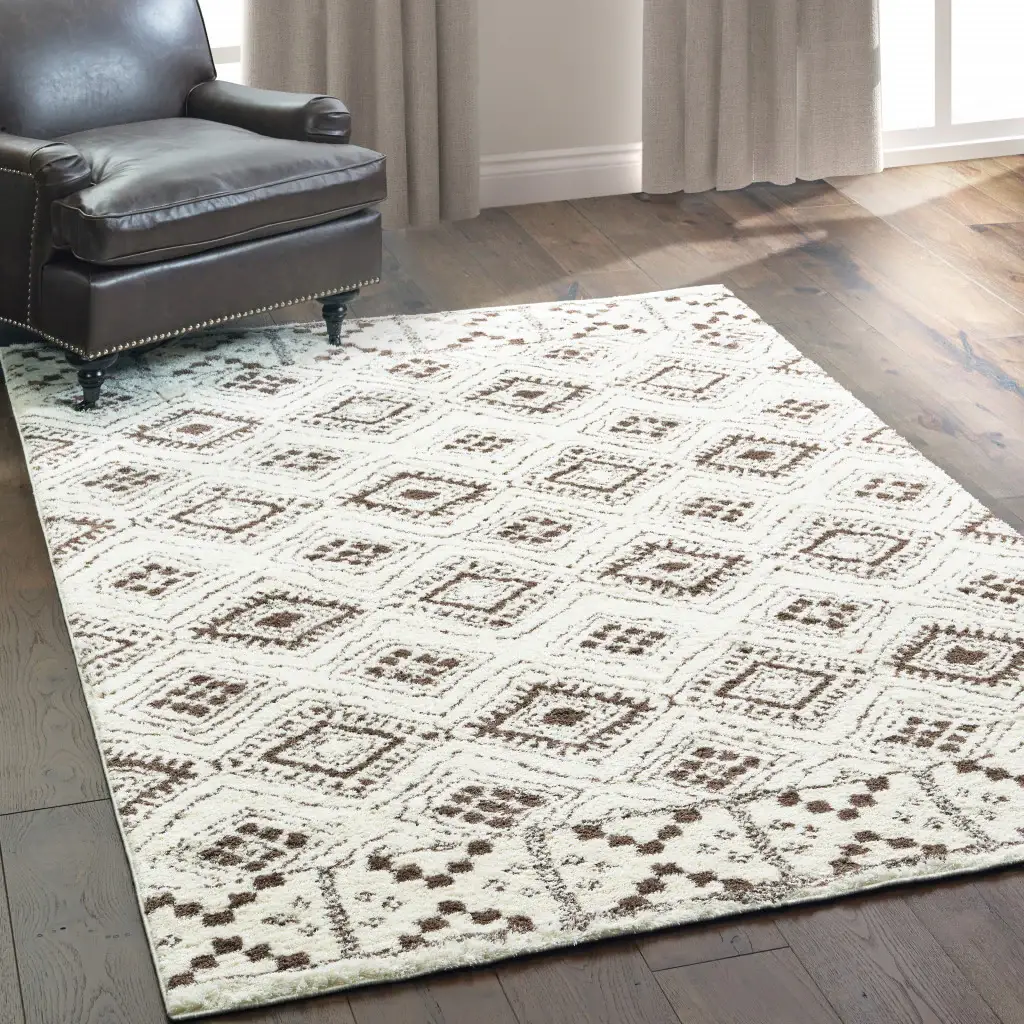 8' X 11' Ivory And Brown Geometric Shag Power Loom Stain Resistant Area Rug - Image 4