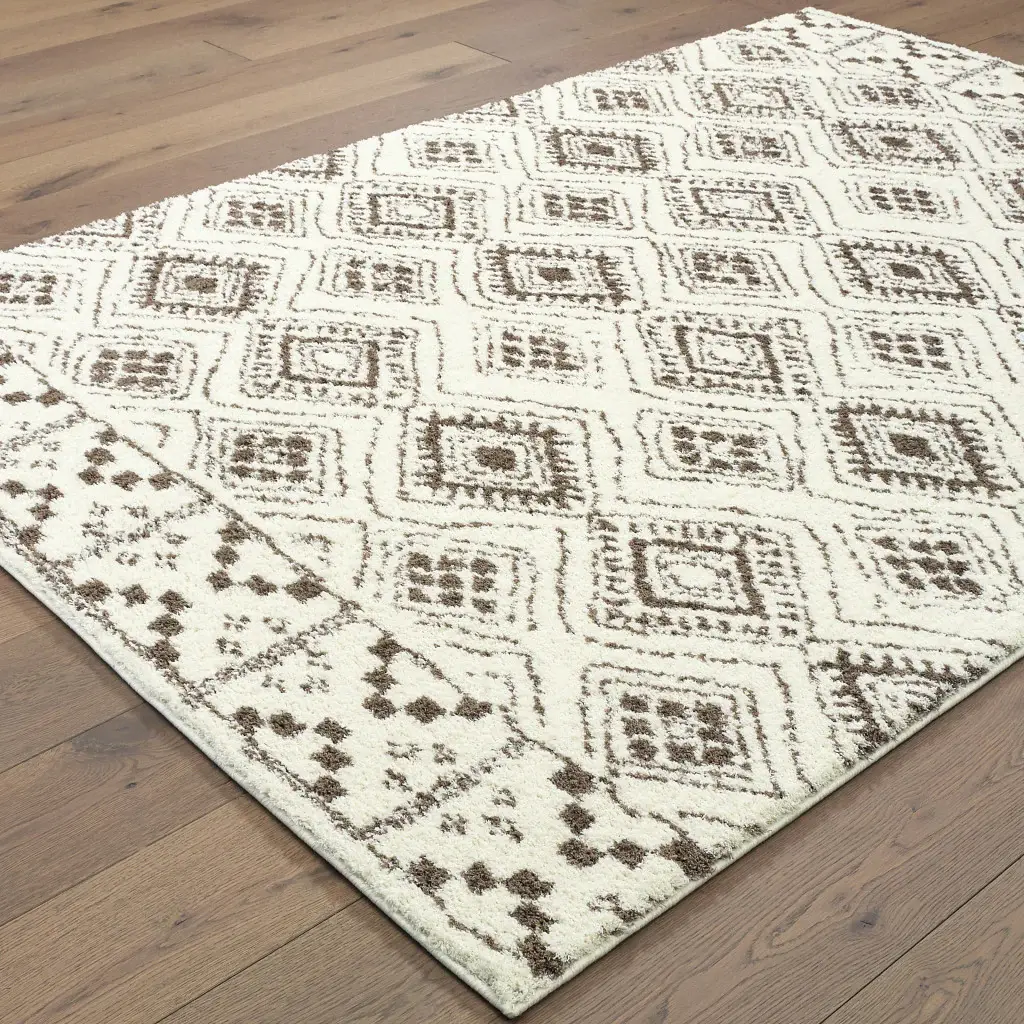 8' X 11' Ivory And Brown Geometric Shag Power Loom Stain Resistant Area Rug - Image 6