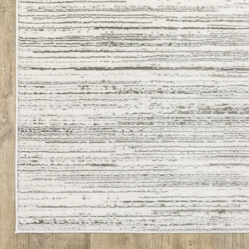 8' X 11' White And Grey Abstract Power Loom Stain Resistant Area Rug - Image 4