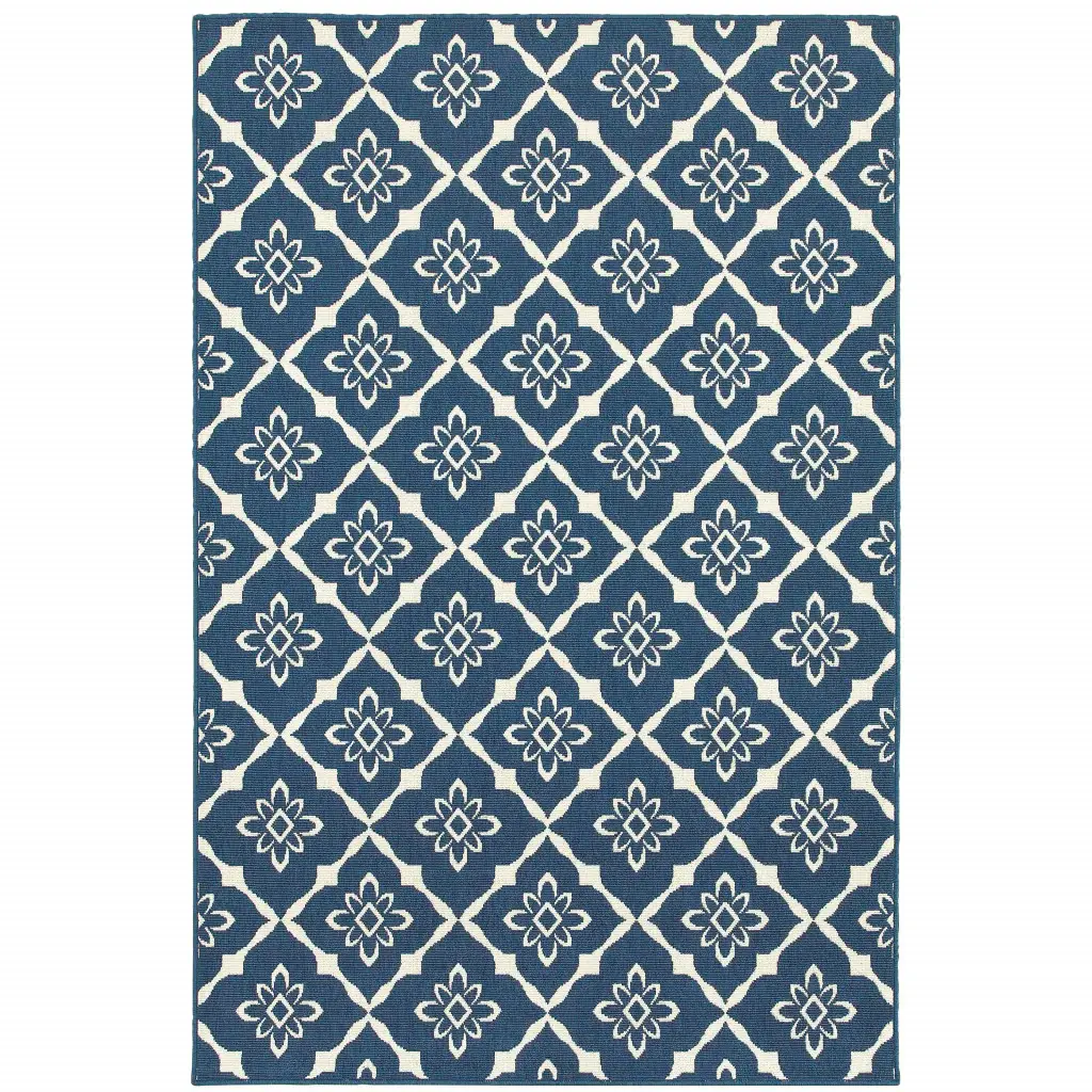 9' X 13' Blue and Ivory Floral Stain Resistant Indoor Outdoor Area Rug