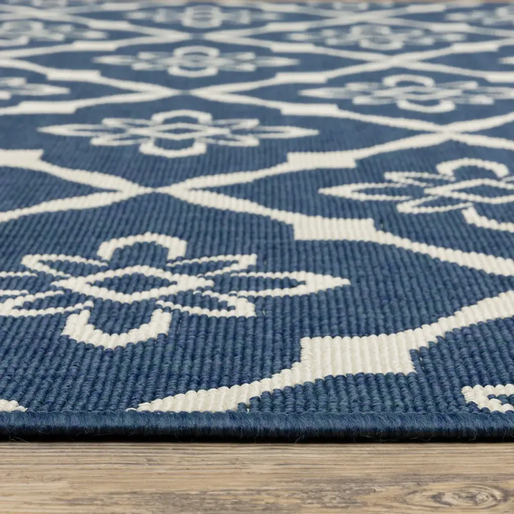 9' X 13' Blue and Ivory Floral Stain Resistant Indoor Outdoor Area Rug - Image 3